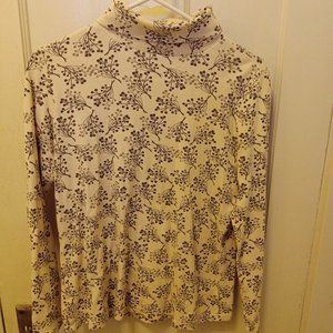 *3 FOR $13* White turtleneck with gray foliage pattern